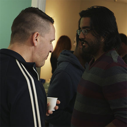 Todd Robertson and Shaq Saillant enjoy some homemade coquito, or Puerto Rican Eggnog.