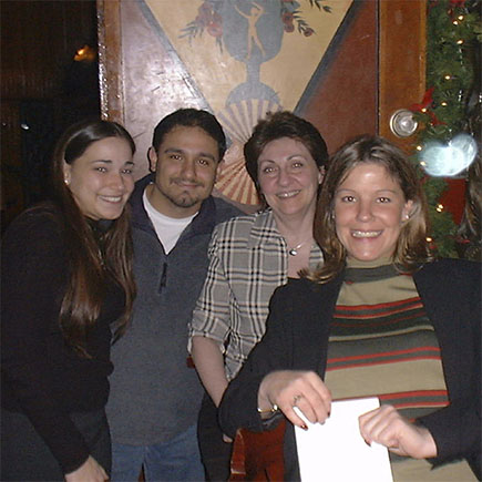 Lisa Calbi, Danny Ferreira, Lucille Teichman, and Elaina Beato at our 2000 holiday party at Finley’s in Huntington