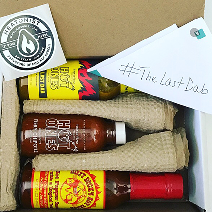 A box of three hot sauces from Heatonist.