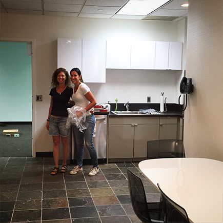 Theresa and Jenn chilling in the new kitchen.